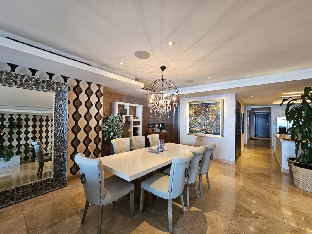 Custom walk-in closet dark wood finishes recessed lighting PH Rivage Panama City