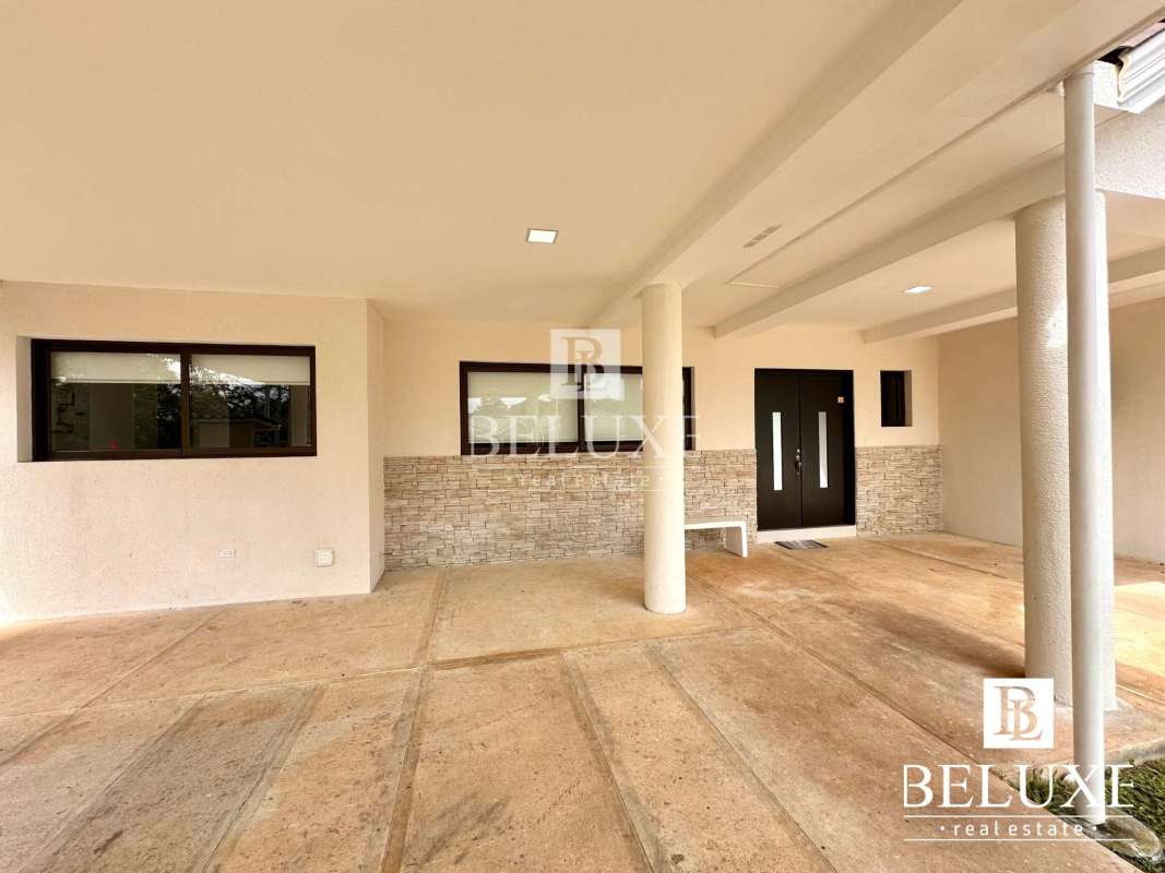 Modern bathroom with porcelain tile, glass shower, Cerro Azul luxury residence