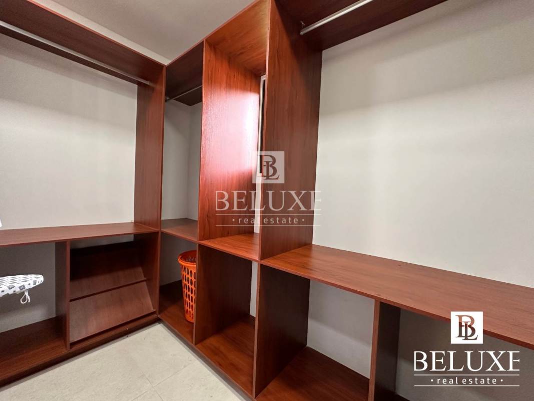 Spacious kitchen with granite countertops, custom cabinetry, island Cerro Azul home