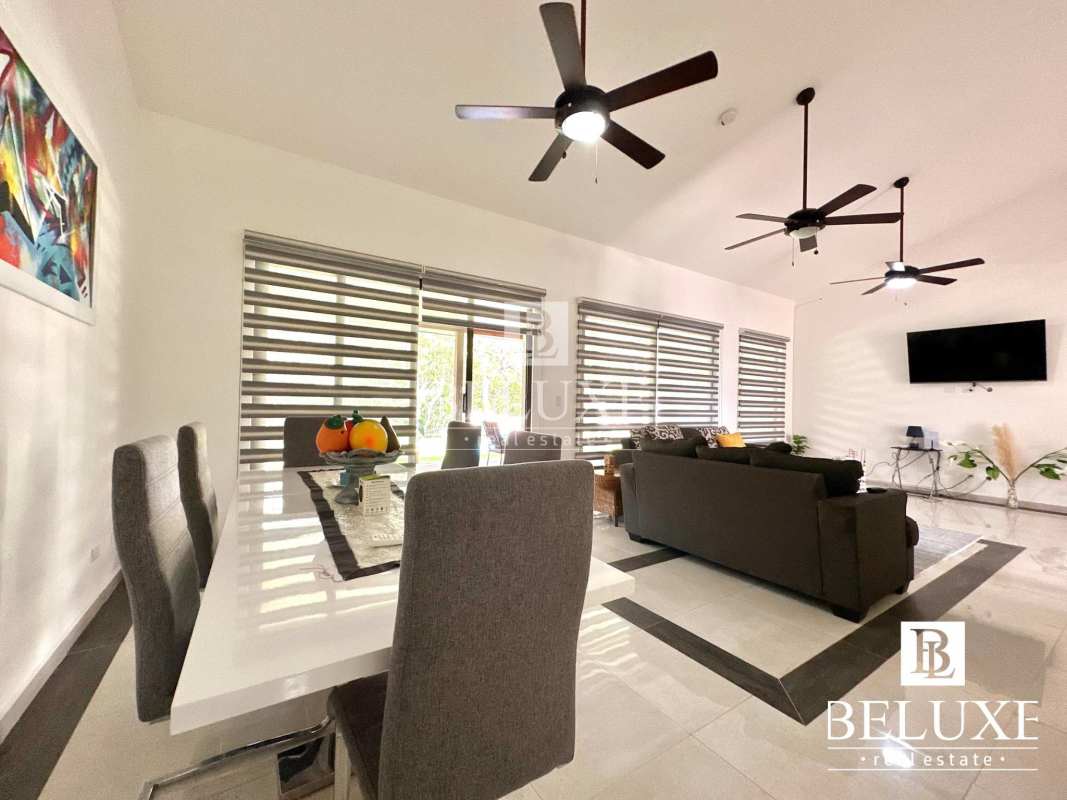 Modern open living and dining room high ceilings in country villa Cerro Azul Panama