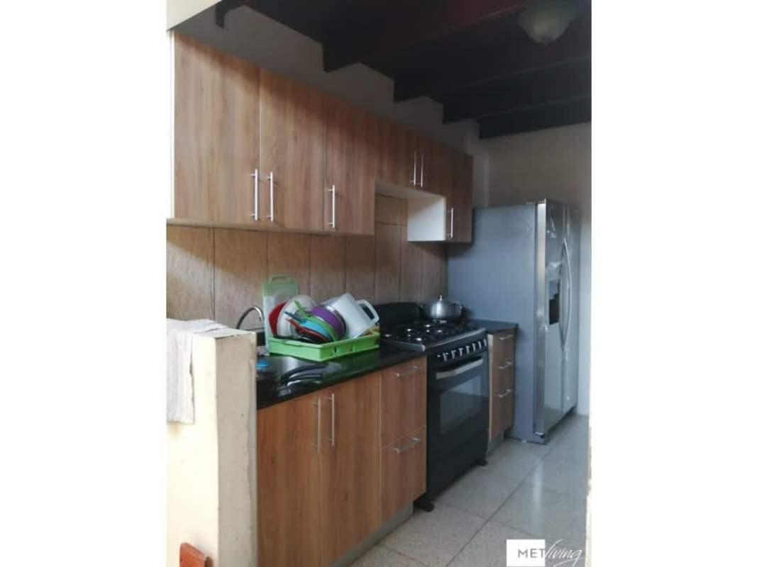 Bedroom with wooden ceiling, window, and spacious design in Bethania Panama house