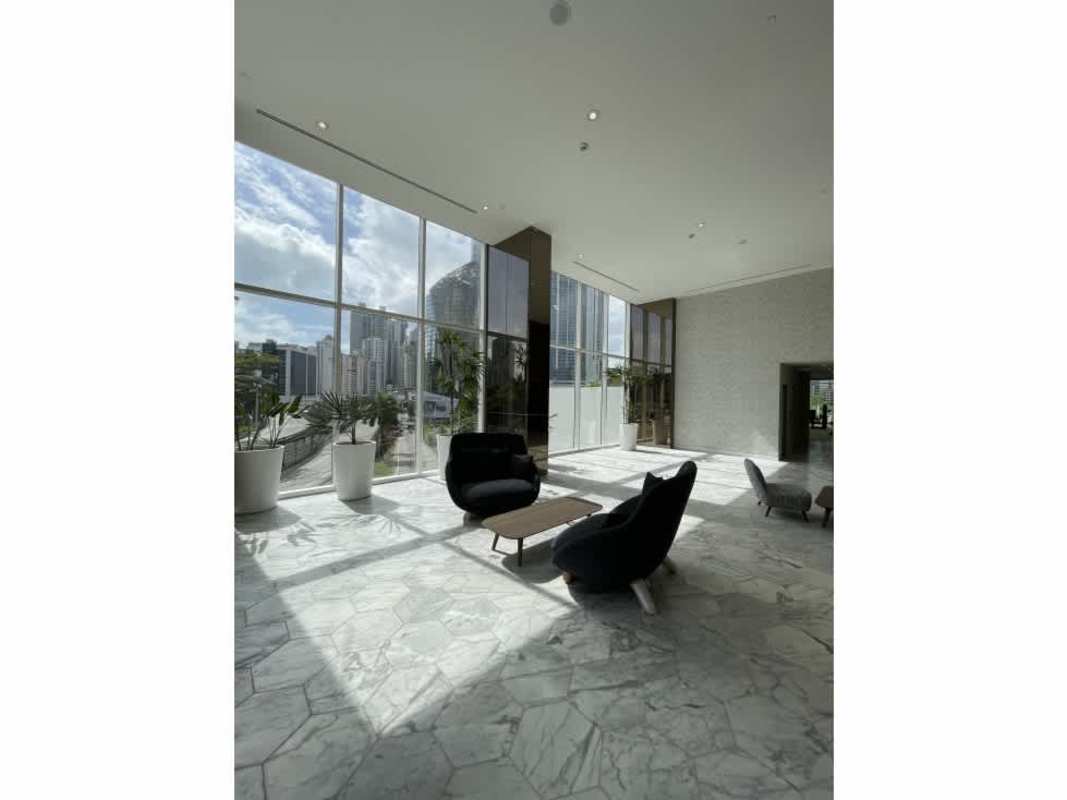 Elegant lobby with city skyline views and marble flooring at Torre Norte Wanders Yoo Marbella