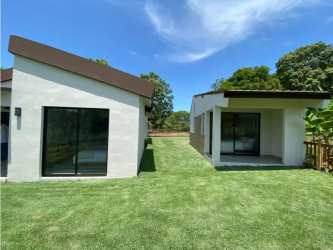 Open plan living area with skylight, vaulted ceiling at Terra Viva Coronado Panama