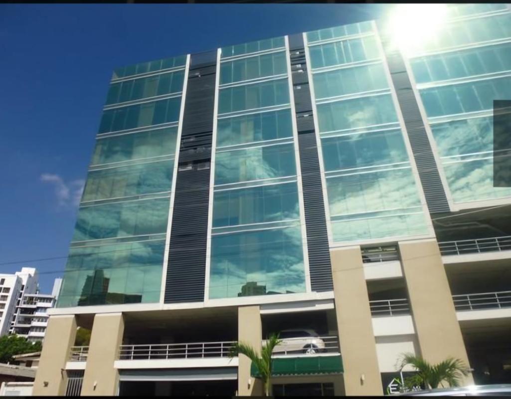 Glass modern commercial office tower in Panama City PH Centro Empresarial Mar del Sur