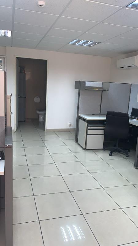 Office area with cubicles, filing cabinets, glass door PH Centro Empresarial Mar del Sur Panama