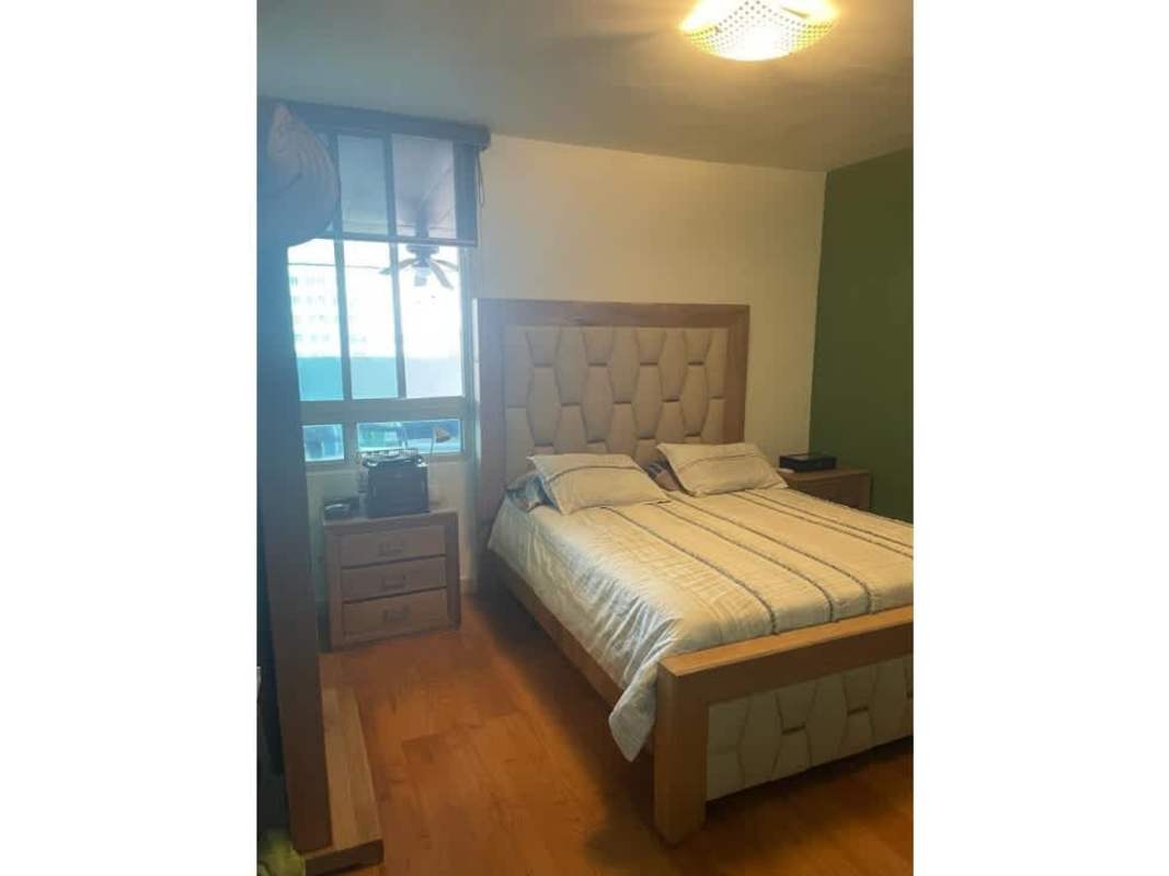 Kid's playground set and lush artificial grass terrace in apartment Cangrejo 507 Panama City