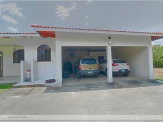 Ample fenced lot garden lawn mature trees Santa Clara Coclé Panama beach house for sale