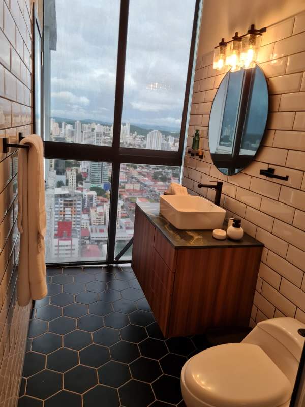 Luxury bedroom with modern finishes and panoramic views triplex penthouse PH Quadrat San Francisco Panama