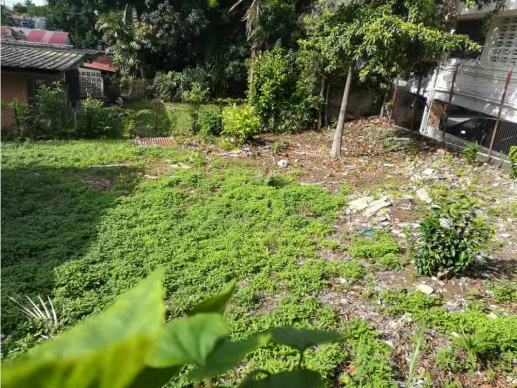 Flat commercial-zoned lot with perimeter fencing near Coco del Mar Panama