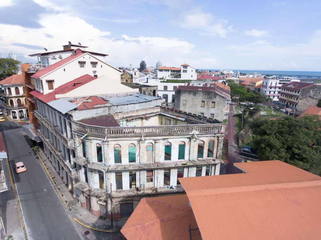 Aerial of colonial corner building surrounded by historic Casco Viejo neighborhood Panama investment opportunity
