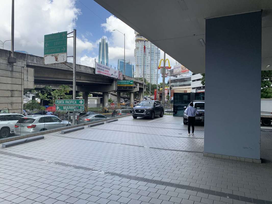 City sidewalk view near main road and RBS Tower entrance Punta Paitilla Panama