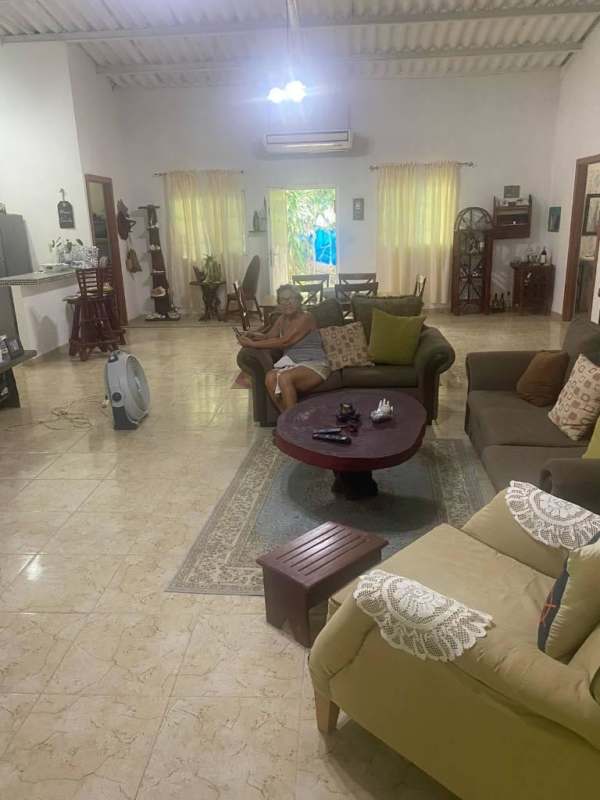 Spacious living dining area tiled with AC and large windows in El Higo house Panama for sale