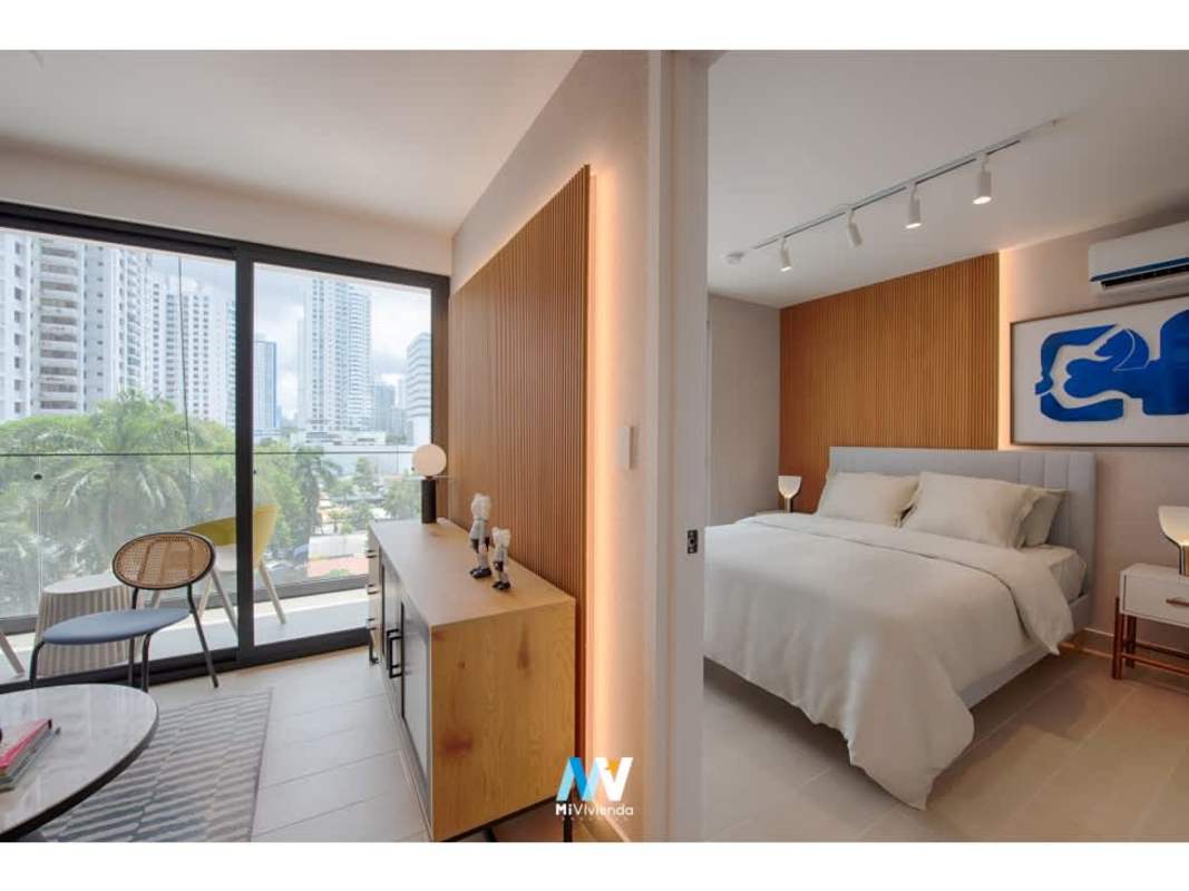 Spacious bedroom with walk-in closet and city views PH Be Living San Francisco Panama