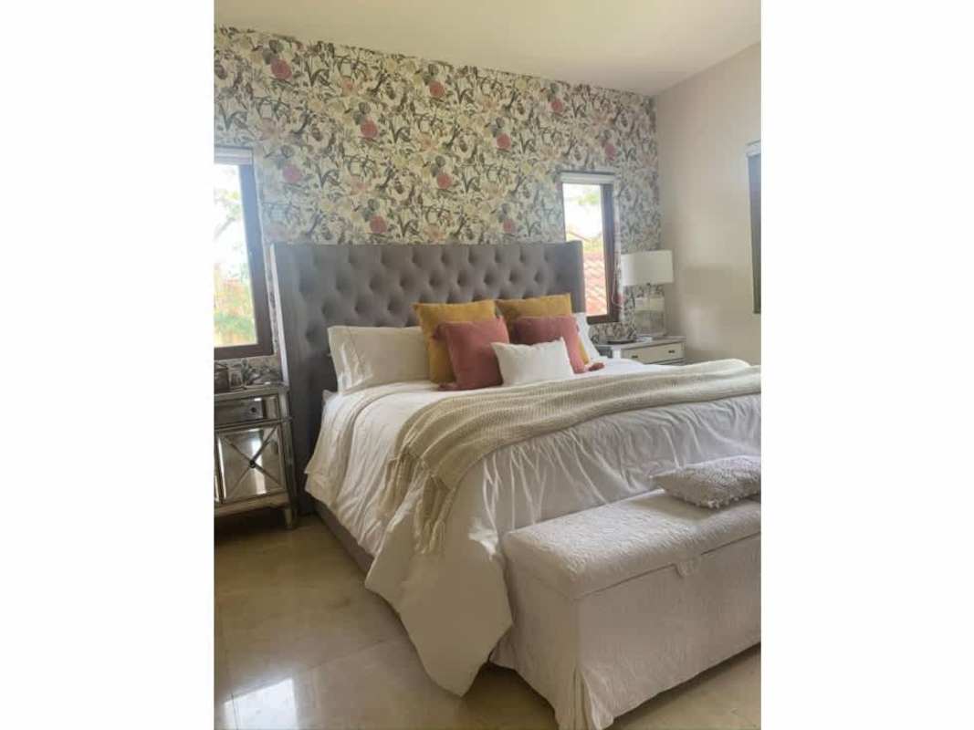 Spacious master bedroom suite with garden view in luxury house Clayton