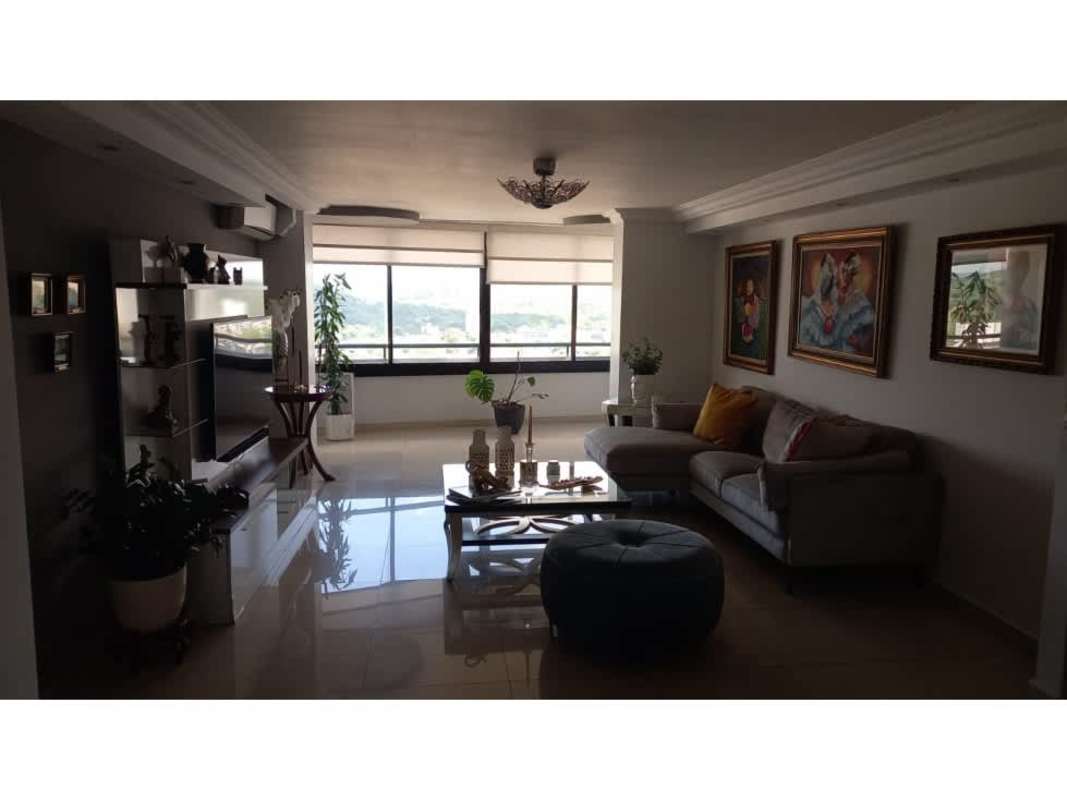 Contemporary kitchen with granite countertops, wood cabinets, gas stove in PH Mirador del Cangrejo