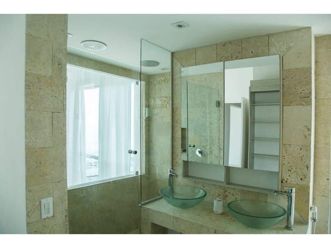 Luxury kitchen with appliances and ocean view in penthouse at Icon Tower Panama City