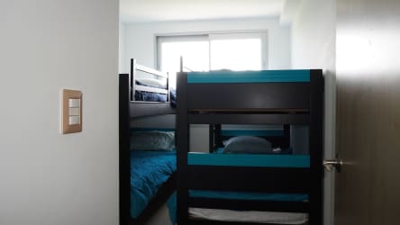 Spacious master bedroom with ocean view balcony access El Palmar Residences Panama