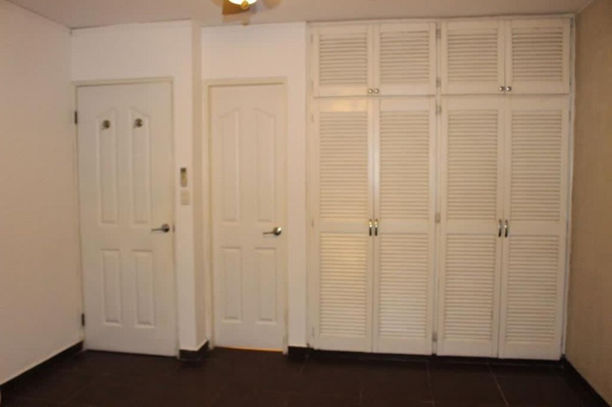 Kitchen with utility laundry area, blue tile floor, window, appliances Royal Plaza Panama