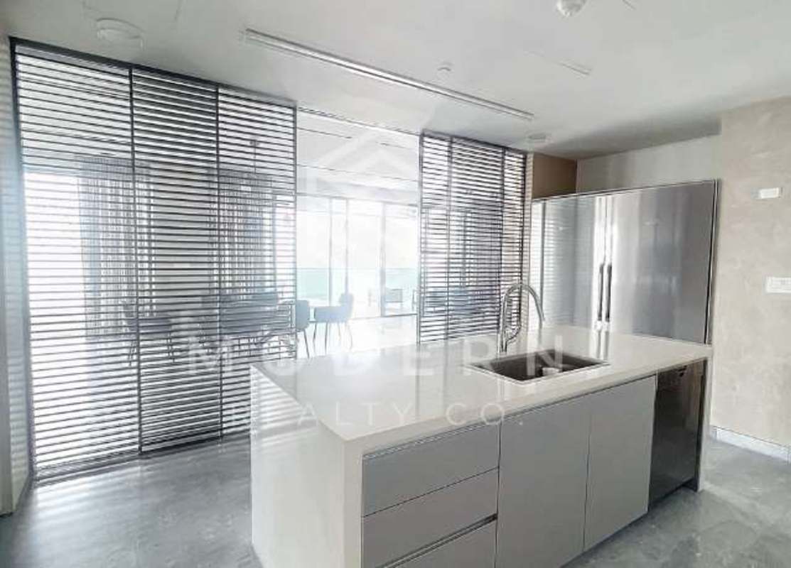 Elegant master bedroom with ocean views floor-to-ceiling windows PH Costa del Mar Panama