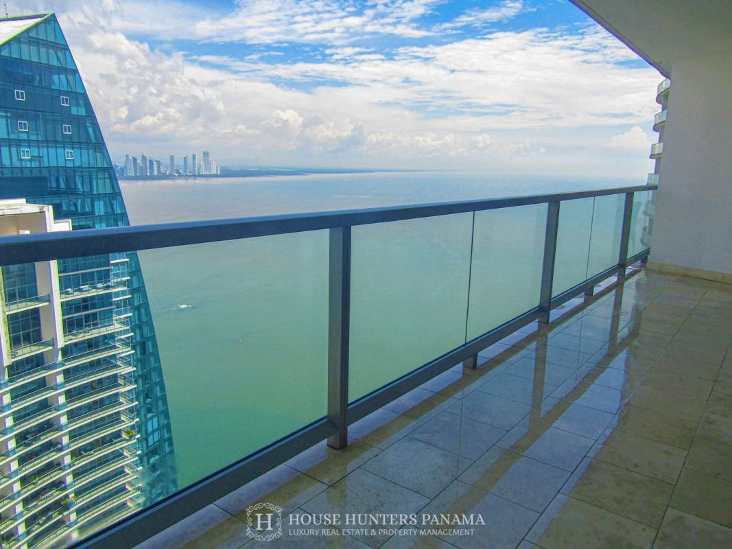 Spacious glass balcony with Pacific ocean and skyline views in The Ocean Club Punta Pacifica Panama