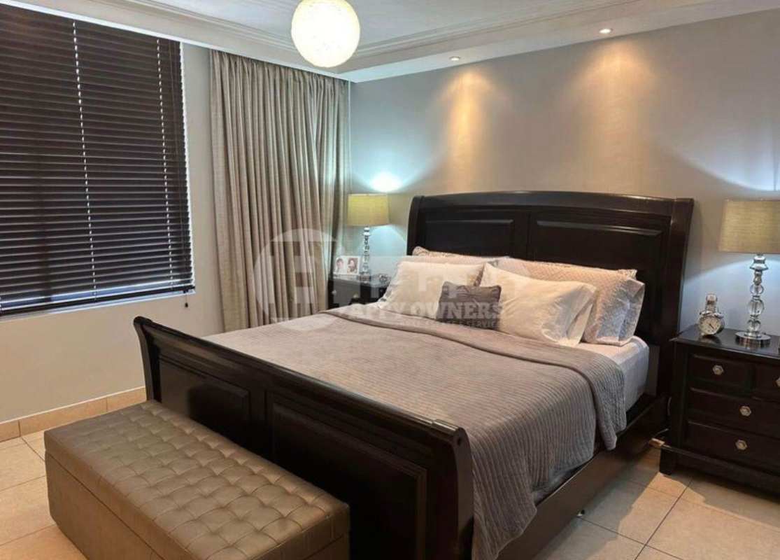 Modern master bedroom with large closet and city views PH Costa View Costa del Este Panama City