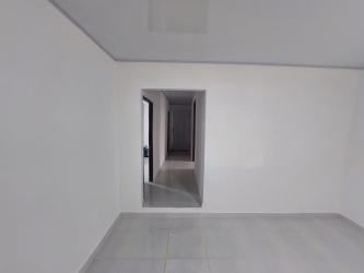 Minimalist open interior with tiled floor in house La Chorrera Panama