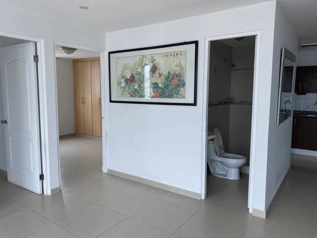 Living room with large windows and city view PH Green Point San Francisco Panama