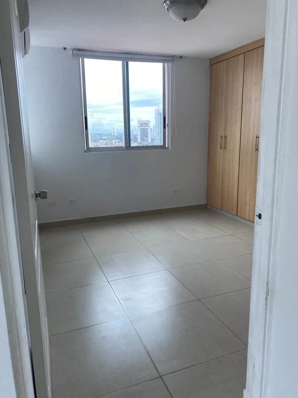 Second bedroom with tile floors, built-in closet, large window and AC in Green Point San Francisco Panama