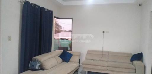 Living area with access to private terrace in Guayacanes house rental Chitré