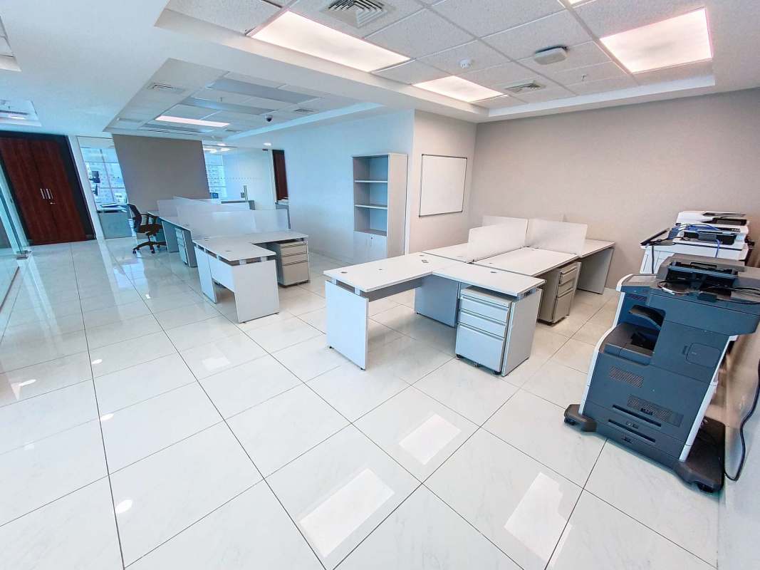 Wide hallway with glass doors and panoramic windows in Hi-Point Obarrio office building