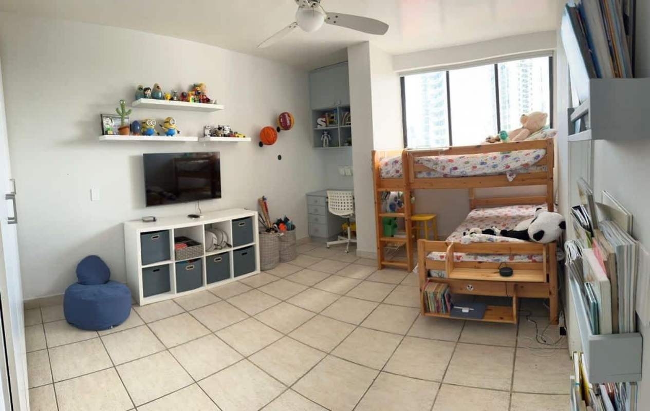 Children’s bedroom with bunk bed, storage, large window and water views PH Cocomar Coco del Mar Panama