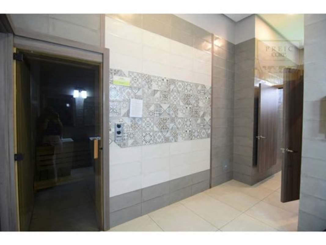 Spacious living room with floor-to-ceiling windows and modern furnishings PH Mirador Costa del Este