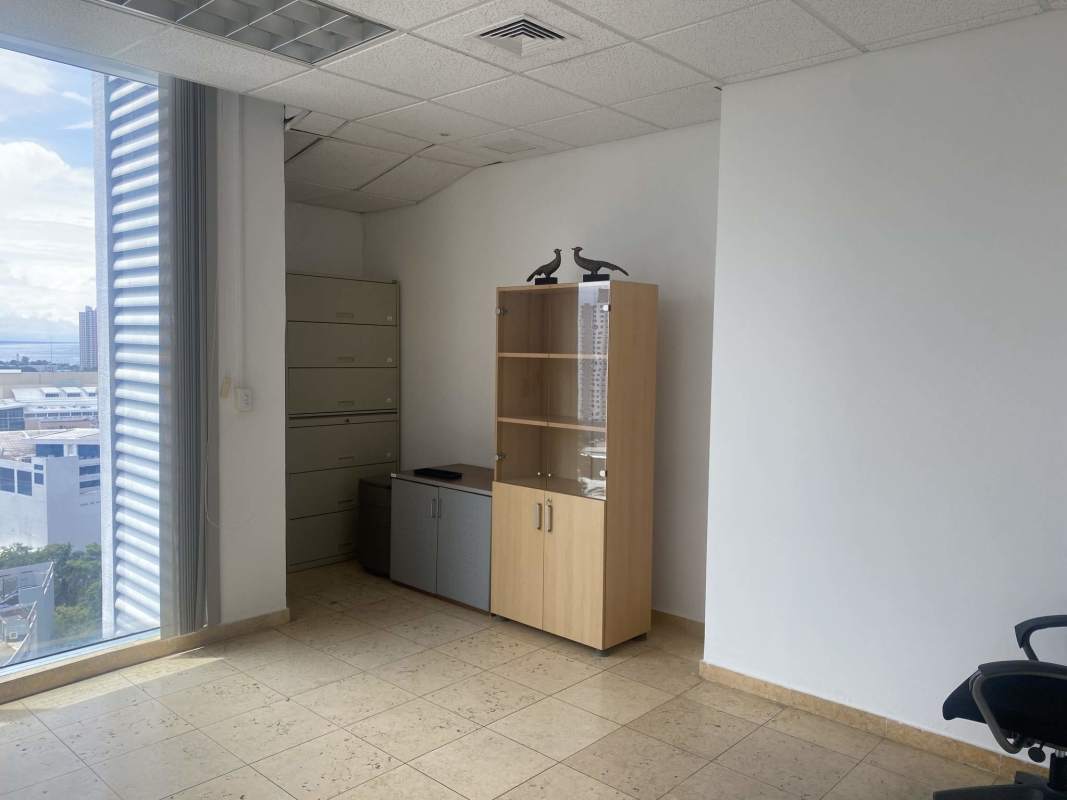 Private office with large window, storage cabinets, modern furniture Global Bank Tower Panama City
