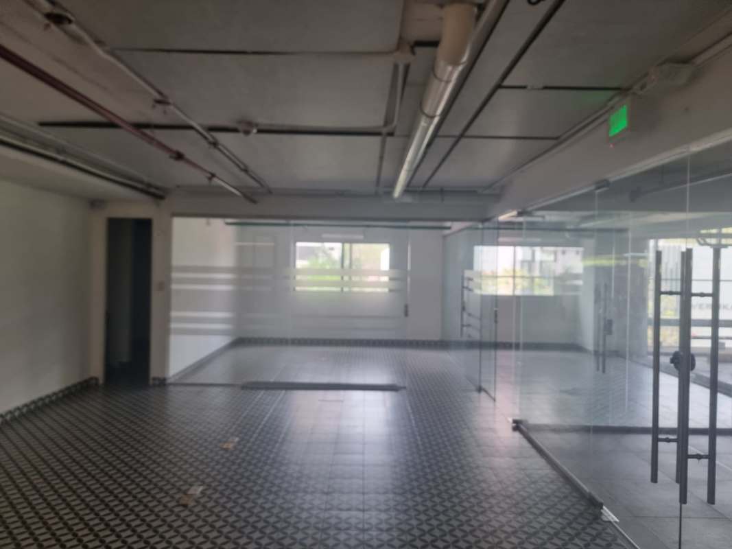 Office space with glass partitions, exposed pipes, tile floor Dream Plaza Costa del Este Panama Panama City