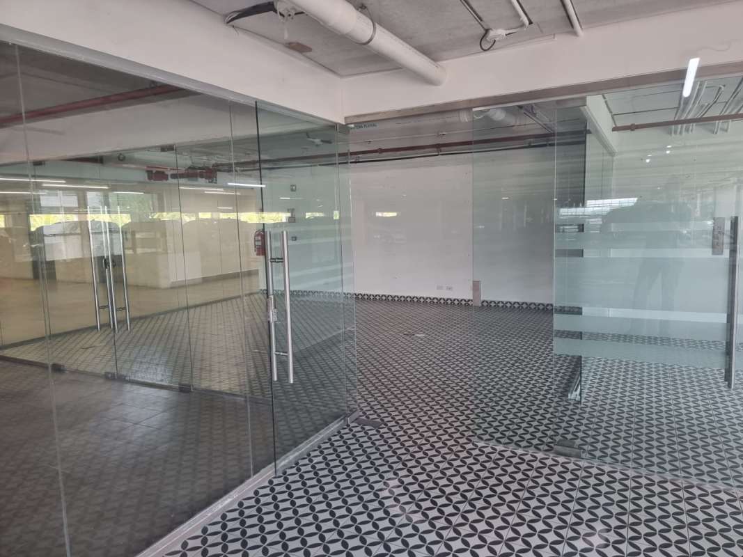 Office interior with private glass offices and open space Dream Plaza Costa del Este Panama City