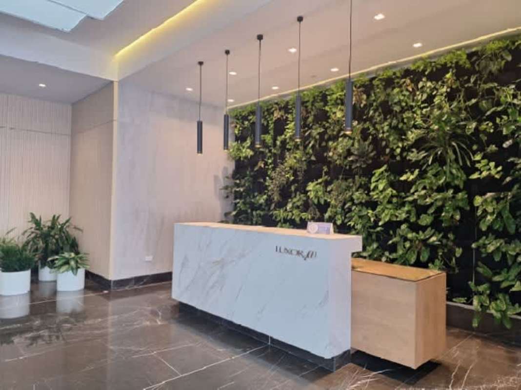 Bright living dining area with sliding doors to balcony in PH Luxor 400 El Cangrejo Panama