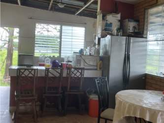 Large kitchen area with bar counter fridge dining space Lago Mar San Carlos