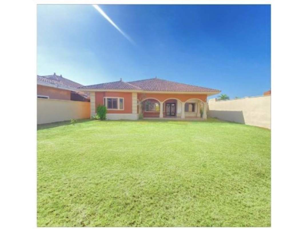 Spacious contemporary kitchen with granite island, stainless steel appliances, and modern cabinets in Sunset Coast Panama City