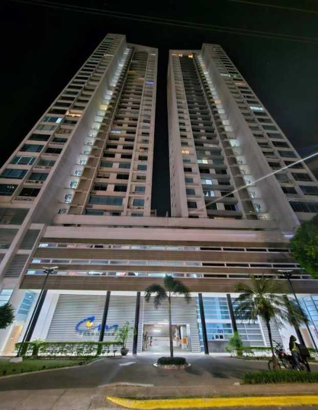 Night view of PH Cabo Marzo twin high-rise towers in Coco del Mar Panama City with illuminated balconies