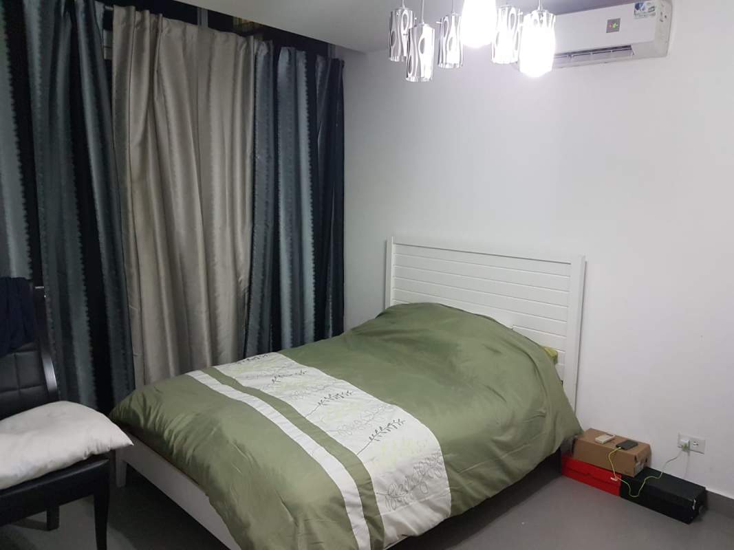 Open plan living with large windows, balcony, and skyline view in PH Colores de Bella Vista Panama City