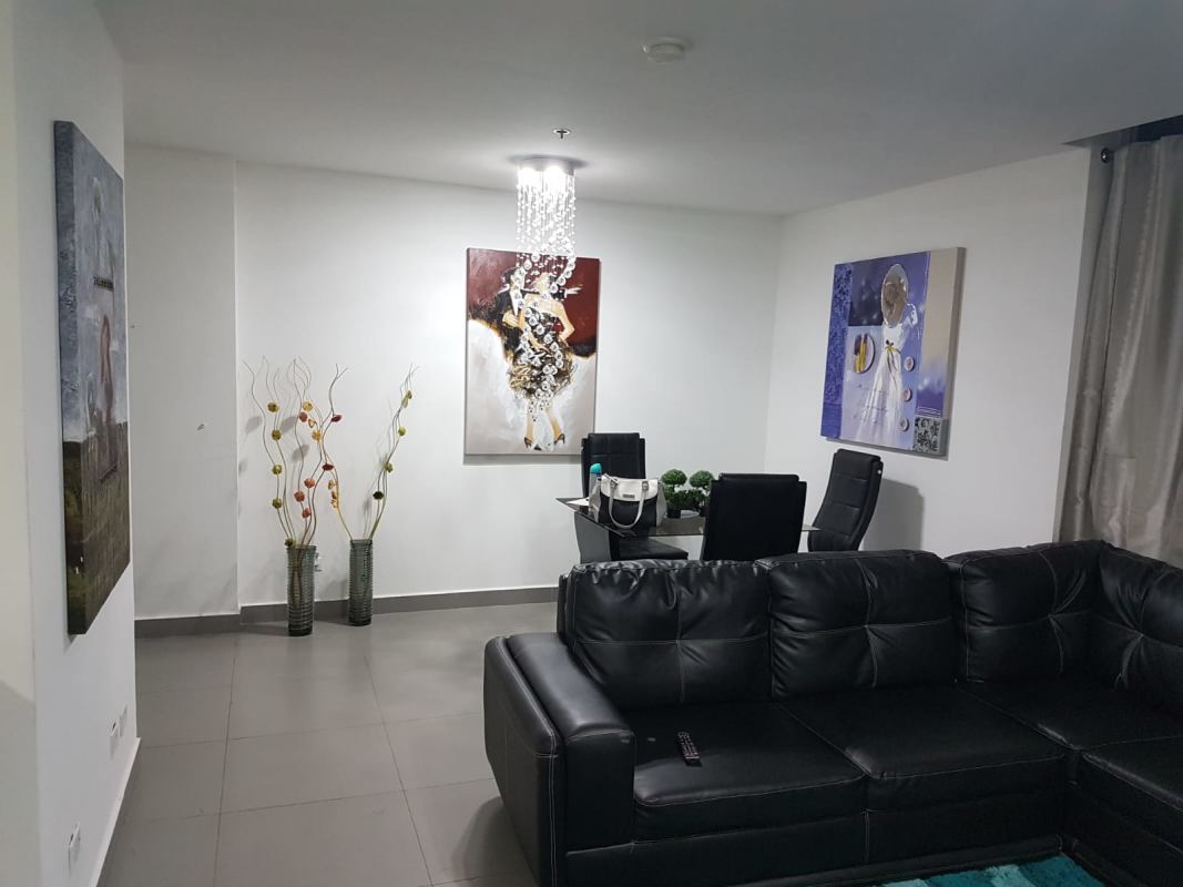 Modern style bathroom with glass shower enclosure and ceramic sink in PH Colores Bella Vista Panama City