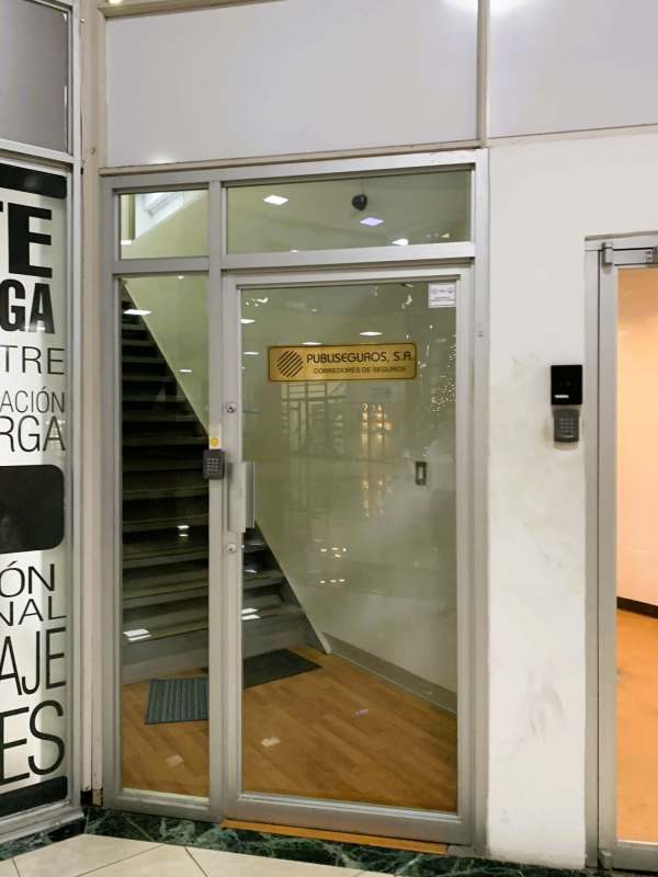 Entrance lobby with glass doors automatic entrance Plaza Paitilla Panama