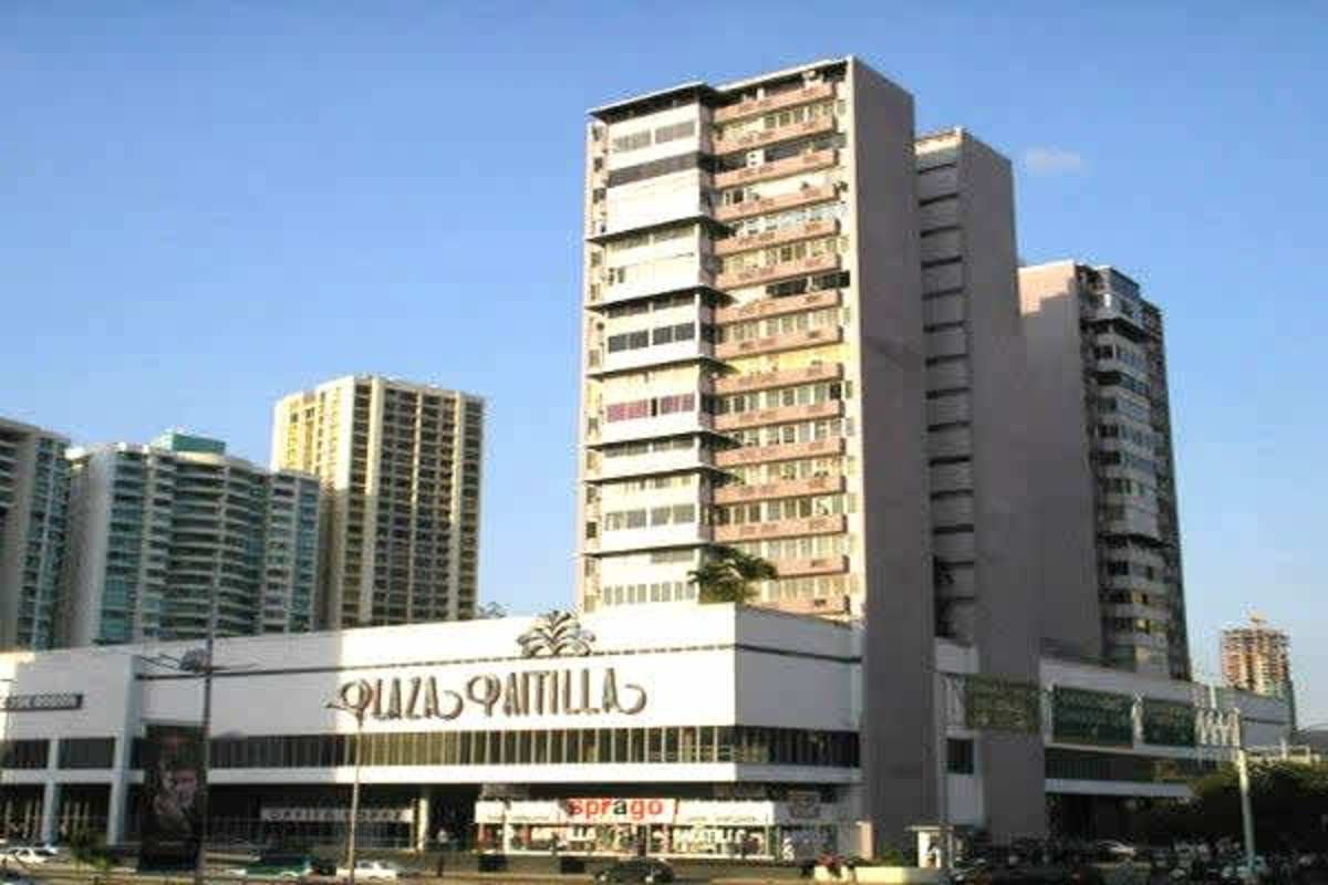 Two-level shopping gallery atrium inside Plaza Paitilla mall Panama City