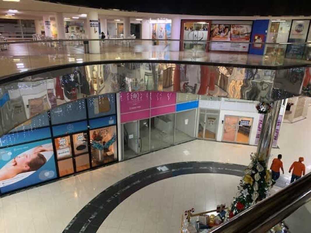 Commercial retail corridor interior with shopfronts Plaza Paitilla Panama
