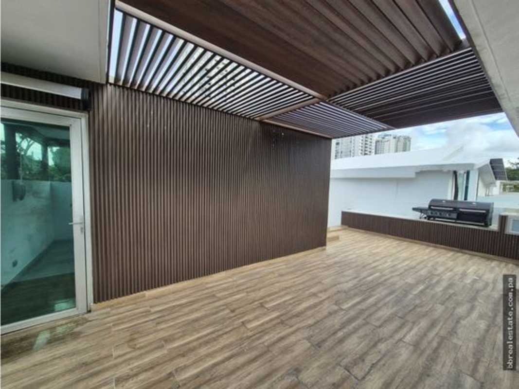 Modern rooftop terrace with pergola BBQ city view minimalist house Panama City