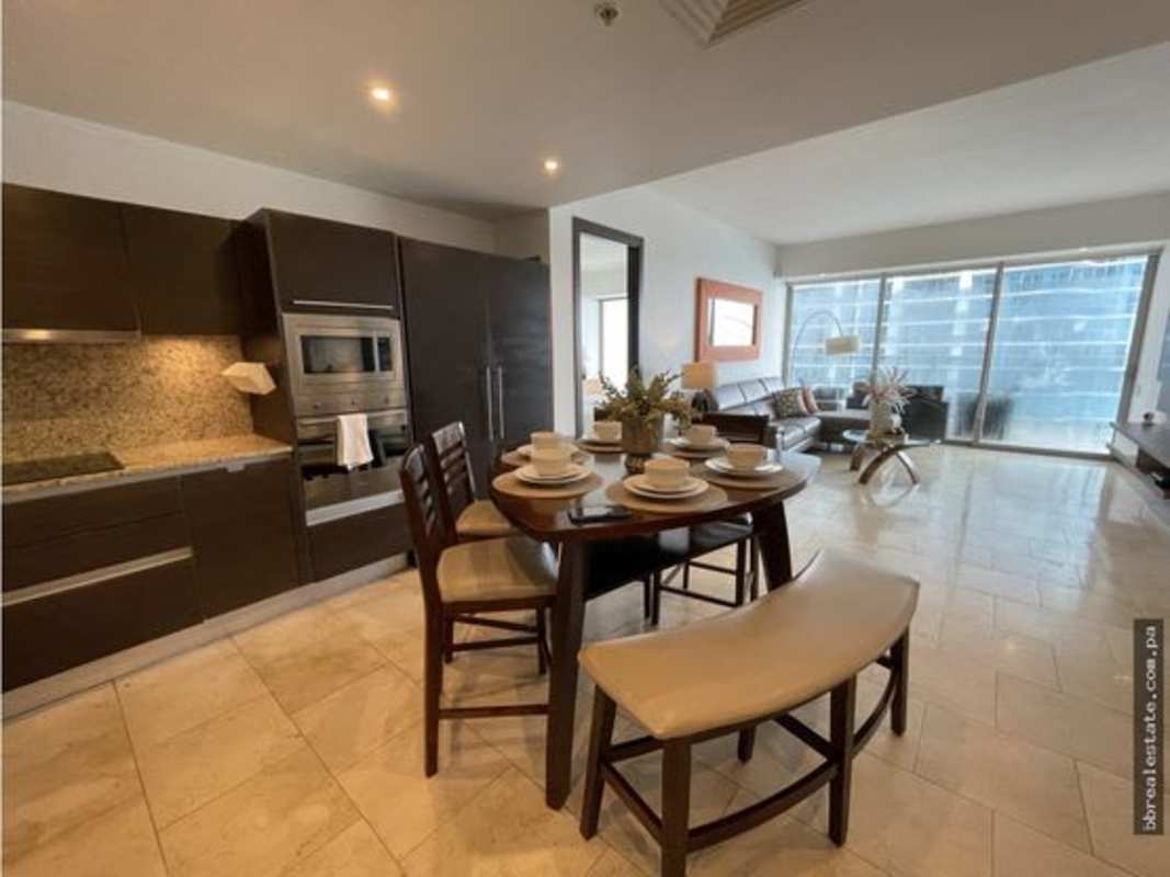 Modern bedroom with ocean view large windows in PH JW Marriott Punta Pacifica Panama