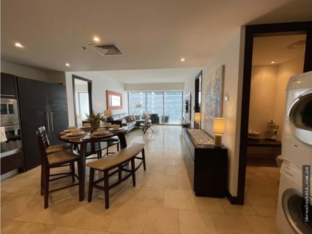 Contemporary kitchen open to living area with city views PH Trump Punta Pacifica Panama