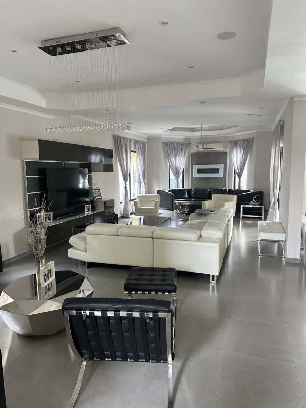 Luxury backyard in Costa del Este home with swimming pool jacuzzi pavilion and children's play area in Las Magnolias Panama