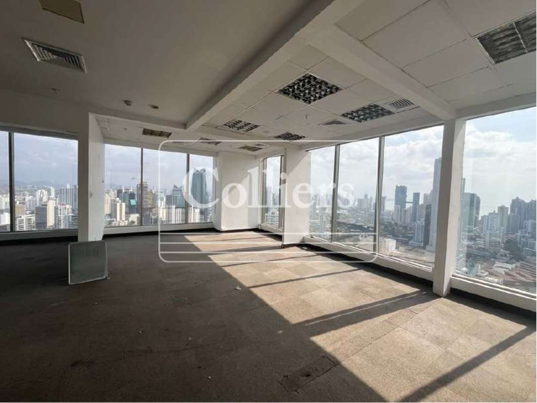 Large customizable open corporate office space with glass partitions carpeted floor and panoramic views in Panama City PH BICSA Tower