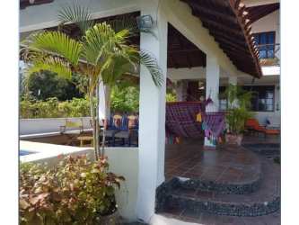 Outdoor patio with hammock dining near beach tropical setting Rio Hato Panama